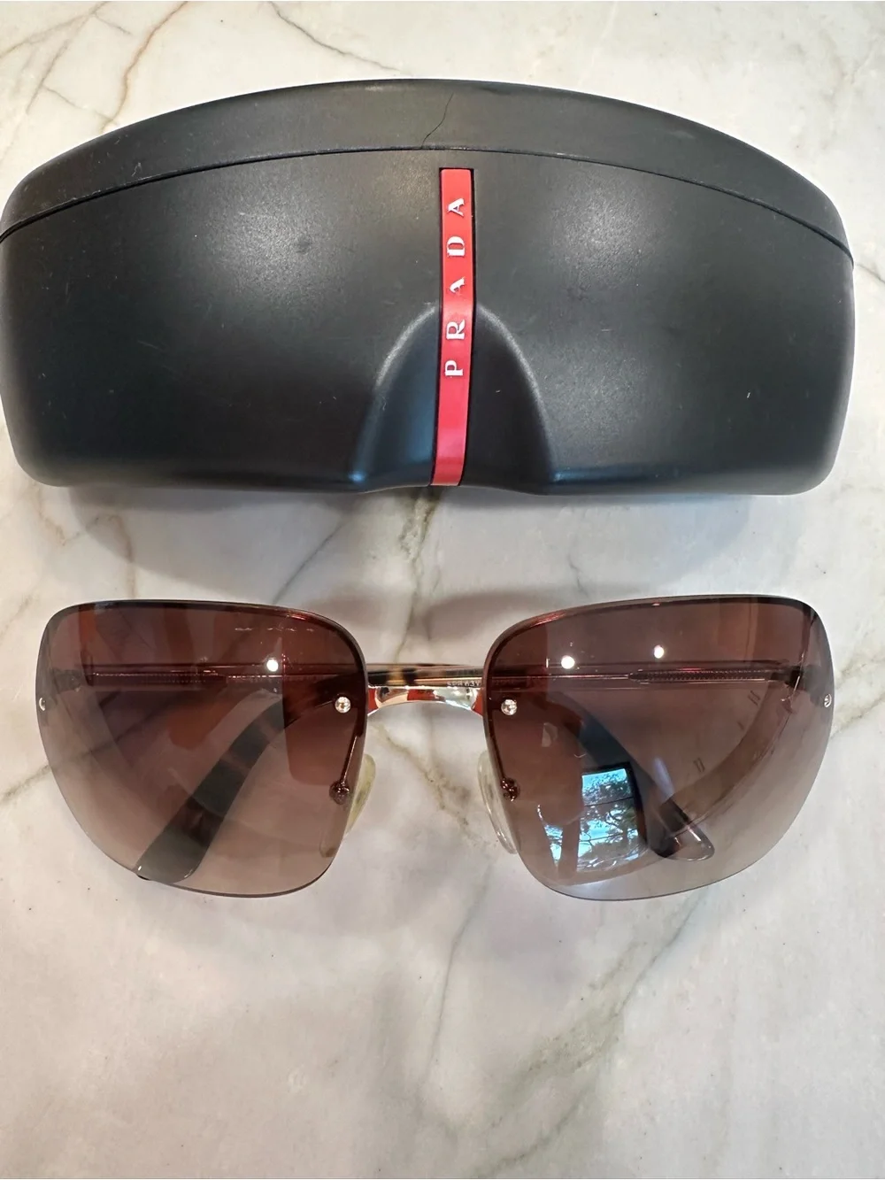 PRADA rimless shield sunglasses